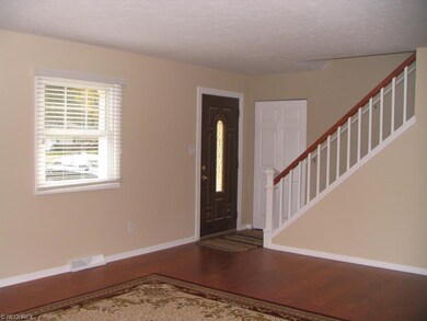 Front Entry, Living Room, and Stairs to Second Flo