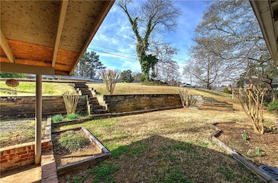 View of yard featuring a garden