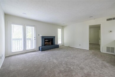Spacious living room filled with natural light, fe