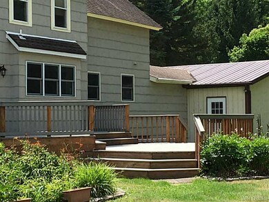 Exterior Front. Two tier Trex deck