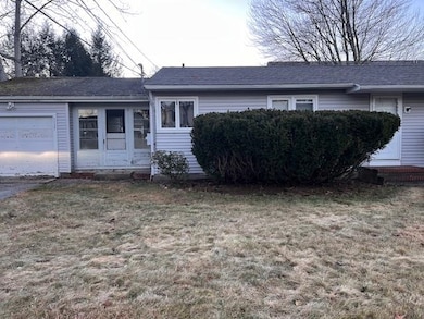 1127 S Mammoth Rd, Manchester, NH 03109 - photo 2