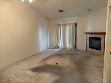 Unfurnished living room featuring visible vents, c