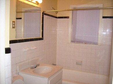 Add your own flair to this nuetral bathroom
