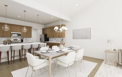 Dining room featuring sink, beam ceiling, and ligh