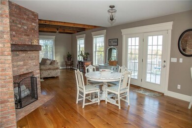 Eat in kitchen area provides open...