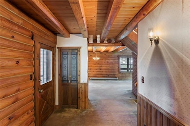 Entrance from Front Porch. View of hallway into Gr