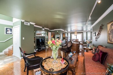 View of living, dining, & kitchen from the far cor