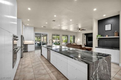 Kitchen featuring a sink, appliances with stainles