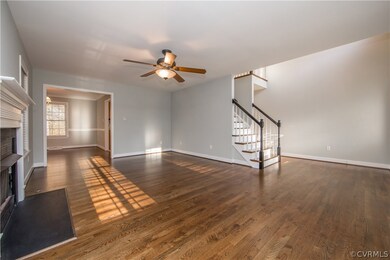 Open floor plan with a beautifully placed staircase