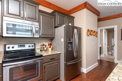 Custom Cabinetry, Stainless Appliances and Brushed