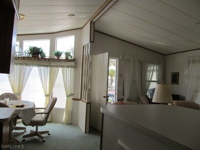 From kitchen, dining room and entrance. Note high