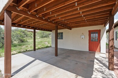Double carport and storage room