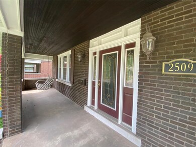 Enjoy the neighborhood from the covered front porch.