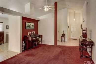 View from back of living room looking towards the front door