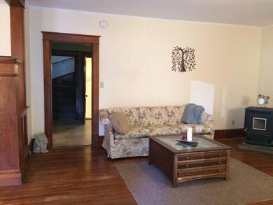 Sunny living room with the warmth of...