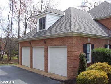 Exterior Front - All brick home with a three car garage...
