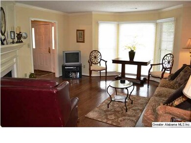 Beautiful living room is oversized and features cr