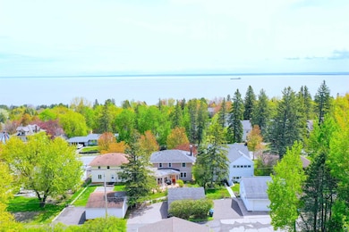 Aerial view of residential area with a nearby body of water