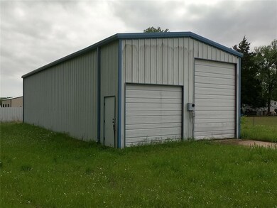 View of outbuilding featuring an outbuilding