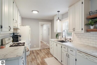 112 N Brand St, Elk Rapids, MI 49629 - photo 6