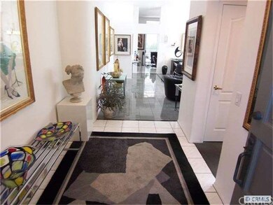 View down entry way towards rest of home