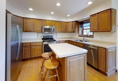 Lots of cabinets , stainless steel appliances