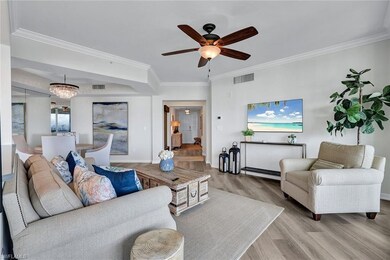 Living room with light hardwood / wood-style floor
