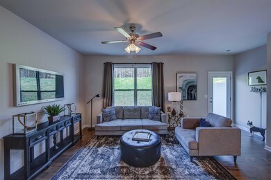Open Concept, lots of natural light.   All photos of another home.  Finishes will vary.