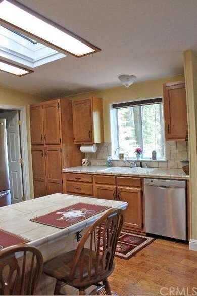 Skylight in Kitchen and a Forest View