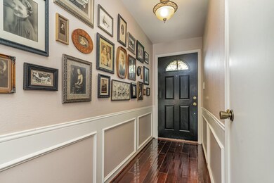 Entry hall  with dark hardwood flooring