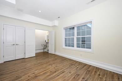 The bonus room has two double closets, one houses 