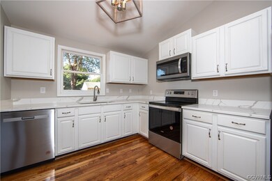 Kitchen with appliances with stainless steel finis