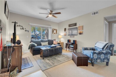 Living area with a ceiling fan