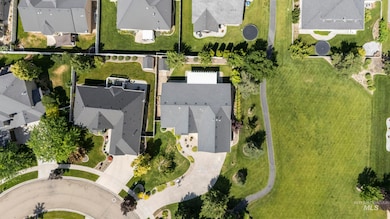 Aerial view of property's location with nearby suburban area