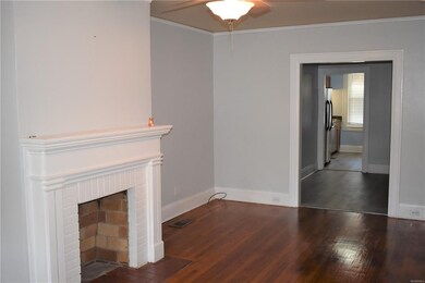 spacious living room with hardwood floors