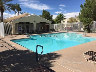 Large community gated pool with clubhouse, gym and