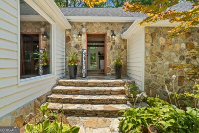 idyllic stone entry and walkway welcoming guests