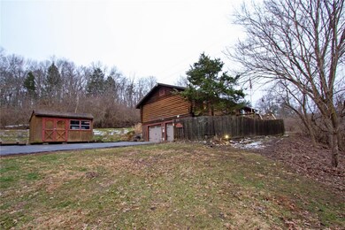 Oversized 2 car garage for parking and bonus Utility Shed for additional storage!