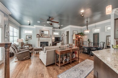 Large living room with solid oak hardwood floors.