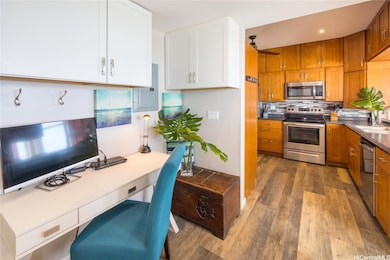 Office nook with the kitchen just beyond
