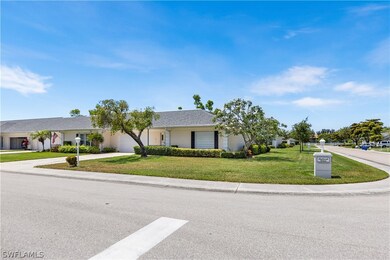 Single story home featuring a front lawn