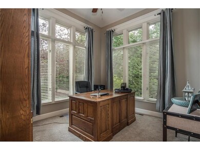 Fabulous 1st Floor Office with full height window.