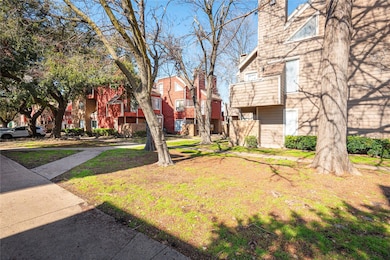 Walkway and side yard to unit entrance.