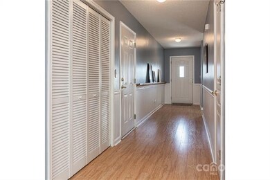 Front hall w/laundry closet