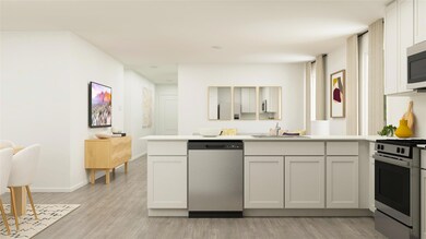 Kitchen with appliances with stainless steel finis