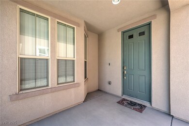 Property entrance with stucco siding