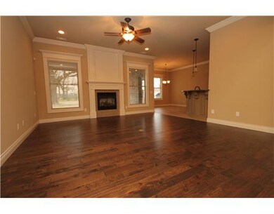 Living Room. Living area has hardwood floors, larg