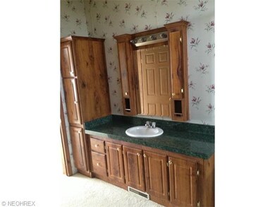 Master bath with handsome cabinets and counters fo