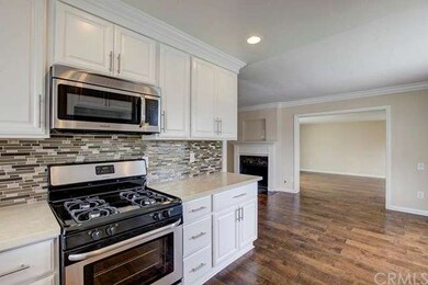 Brand new kitchen with raised panel cabinets, eleg