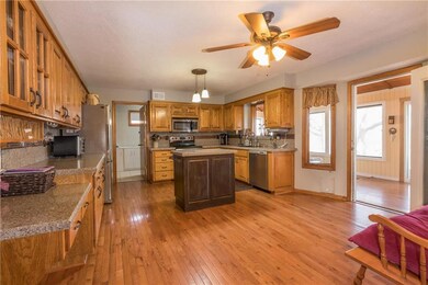 large & updated kitchen open to great room & scree